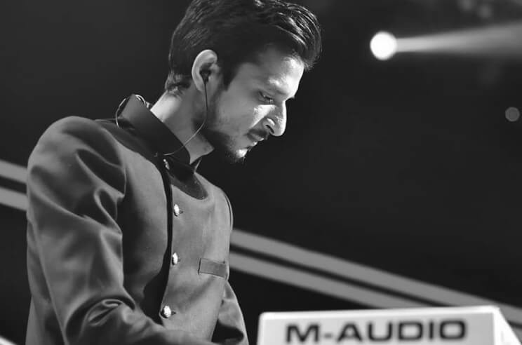 Picture of Rufus Shahzad playing keyboard