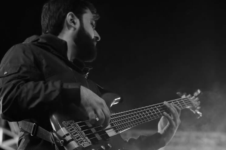 Picture of Waleed Attique playing bass